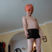 Aqua man, sporting his new gear for swim class. Every Friday (for6 weeks), his class goes to the pool. Required items: speedos, goggles, and a swim cap (deck shoes extra, no board shorts allowed).